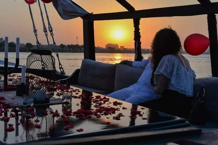 Luxury felucca sailing on the Cairo Nile at sunset on a short Nile cruise with lunch
