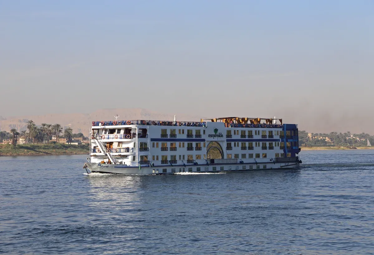 A Nile cruise ship underway on the river near Luxor on a Nile river cruise
